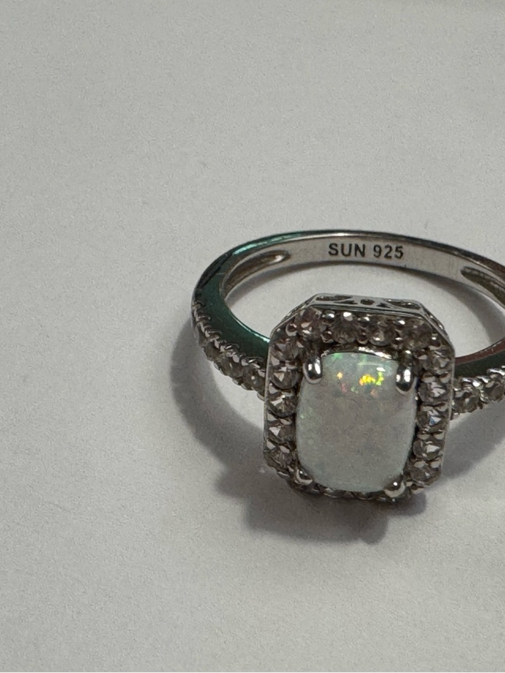 Sterling Opal Halo Ring in White by SUN